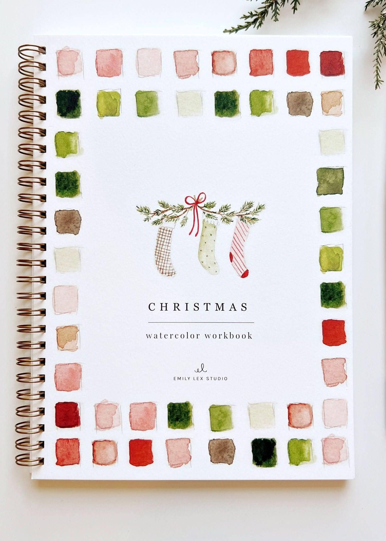 Photo of the front cover of the Christmas Watercolor Workbook.