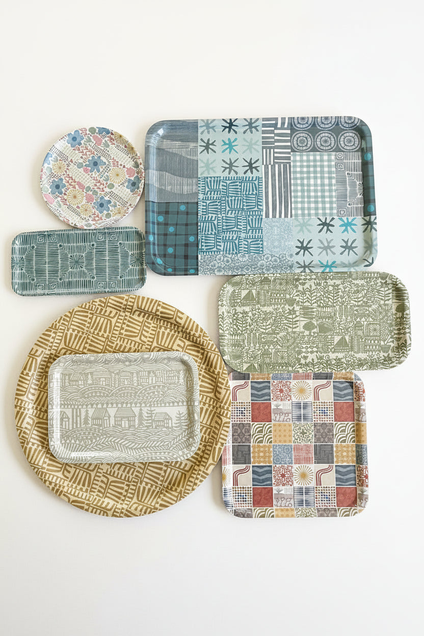 Full collection of seven coordinating serving trays displayed on a white background.