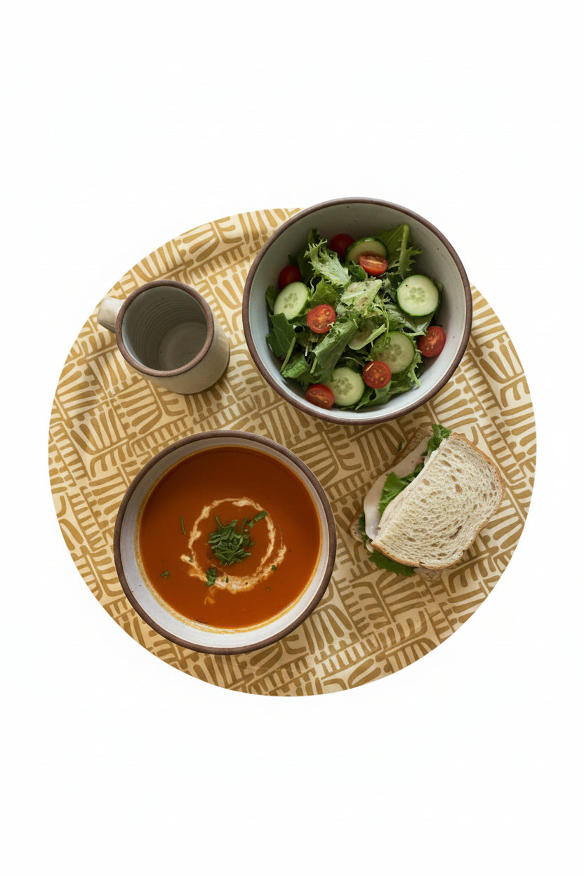 The "Combs" serving tray with bowls of soup and salad, half a sandwich, and a mug.