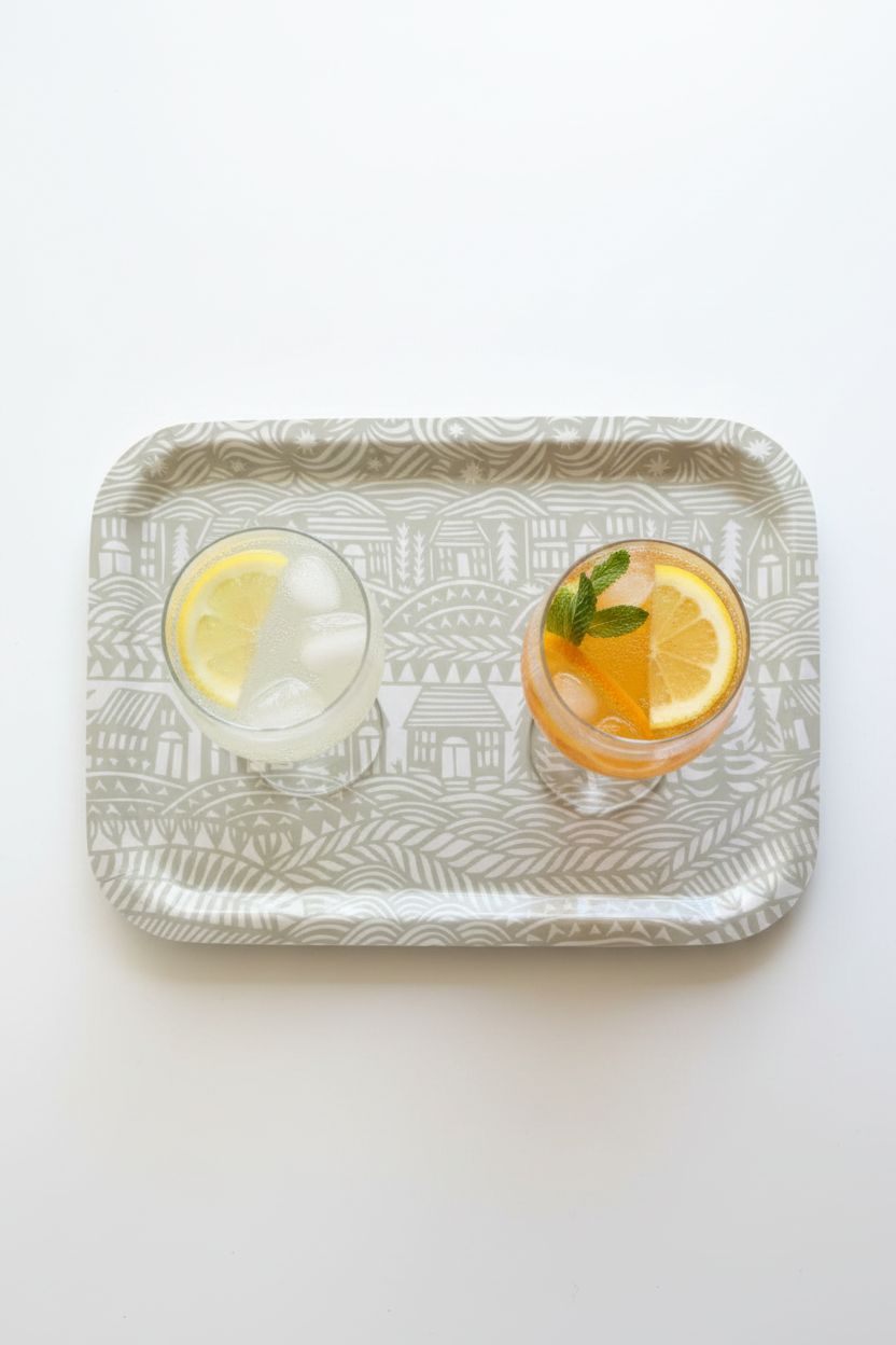"Connections" serving tray with two cocktails.