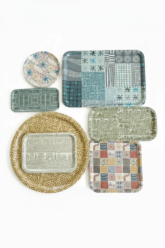 Full collection of seven coordinating serving trays displayed on a white background.