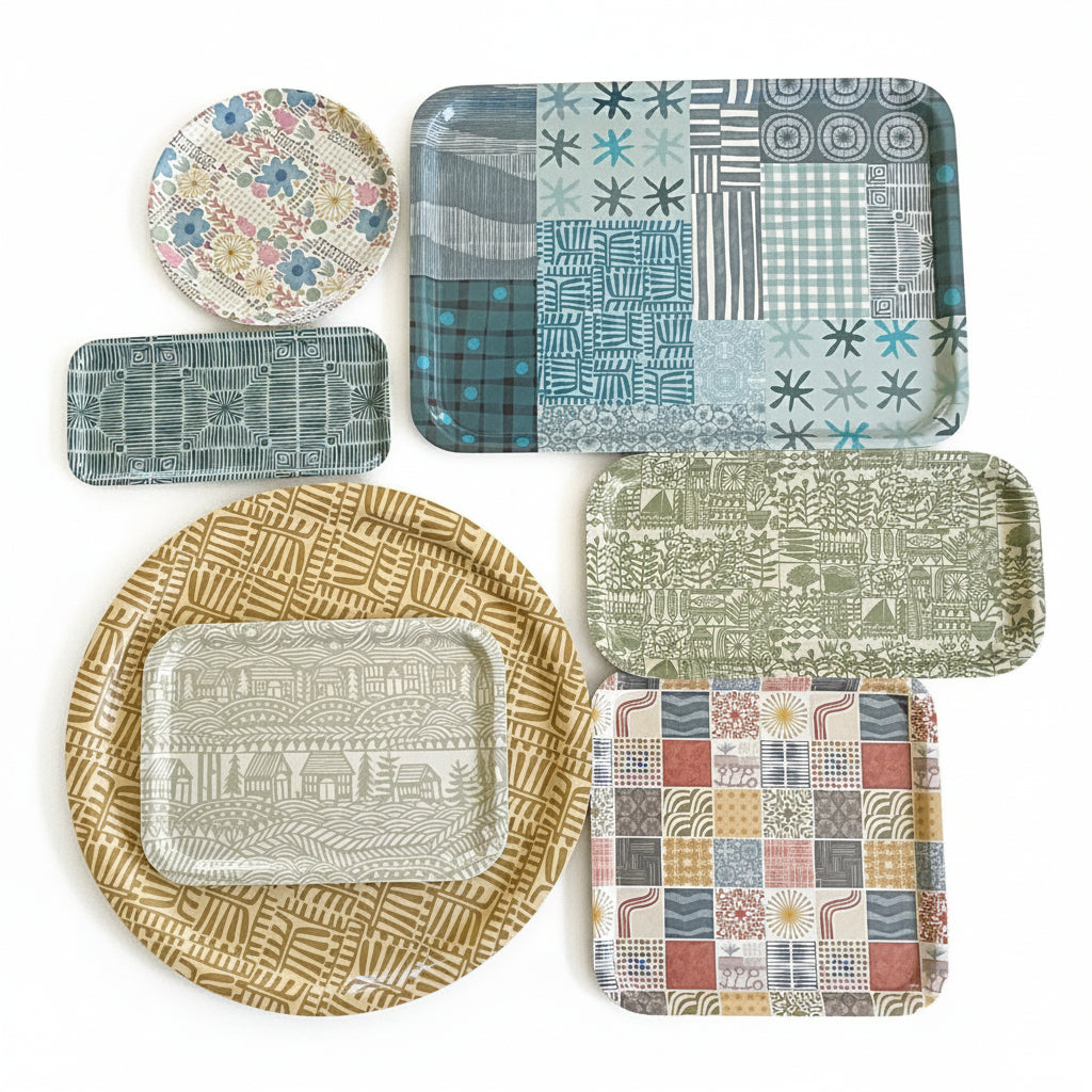 Photo of the full collection of mix and match trays with original artwork by Jennifer Judd-Mcgee.