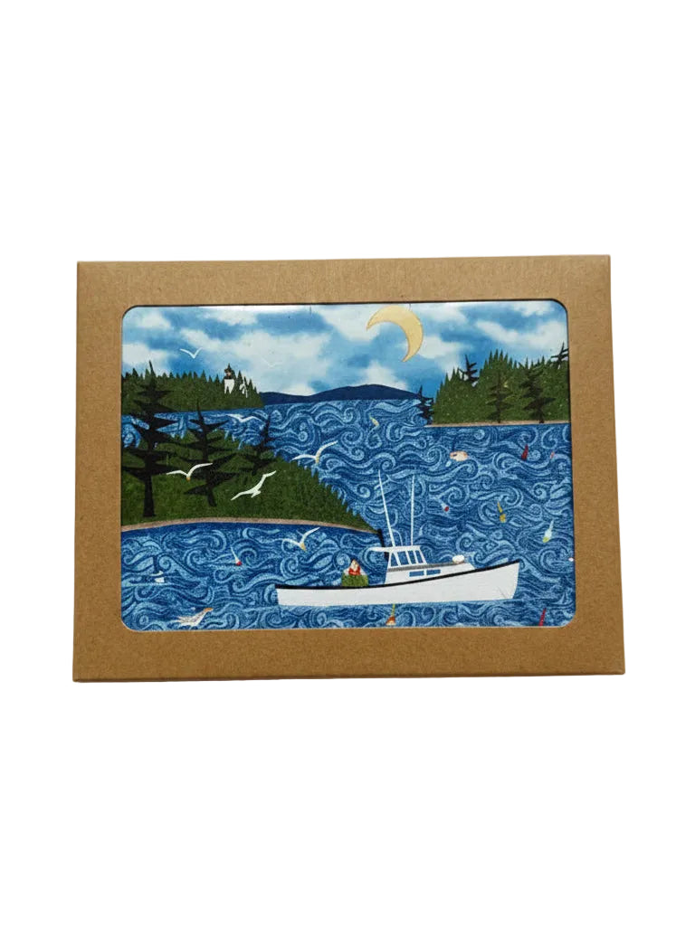 A kraft paper box with a set of 6 "Hauling Traps" blank cards.