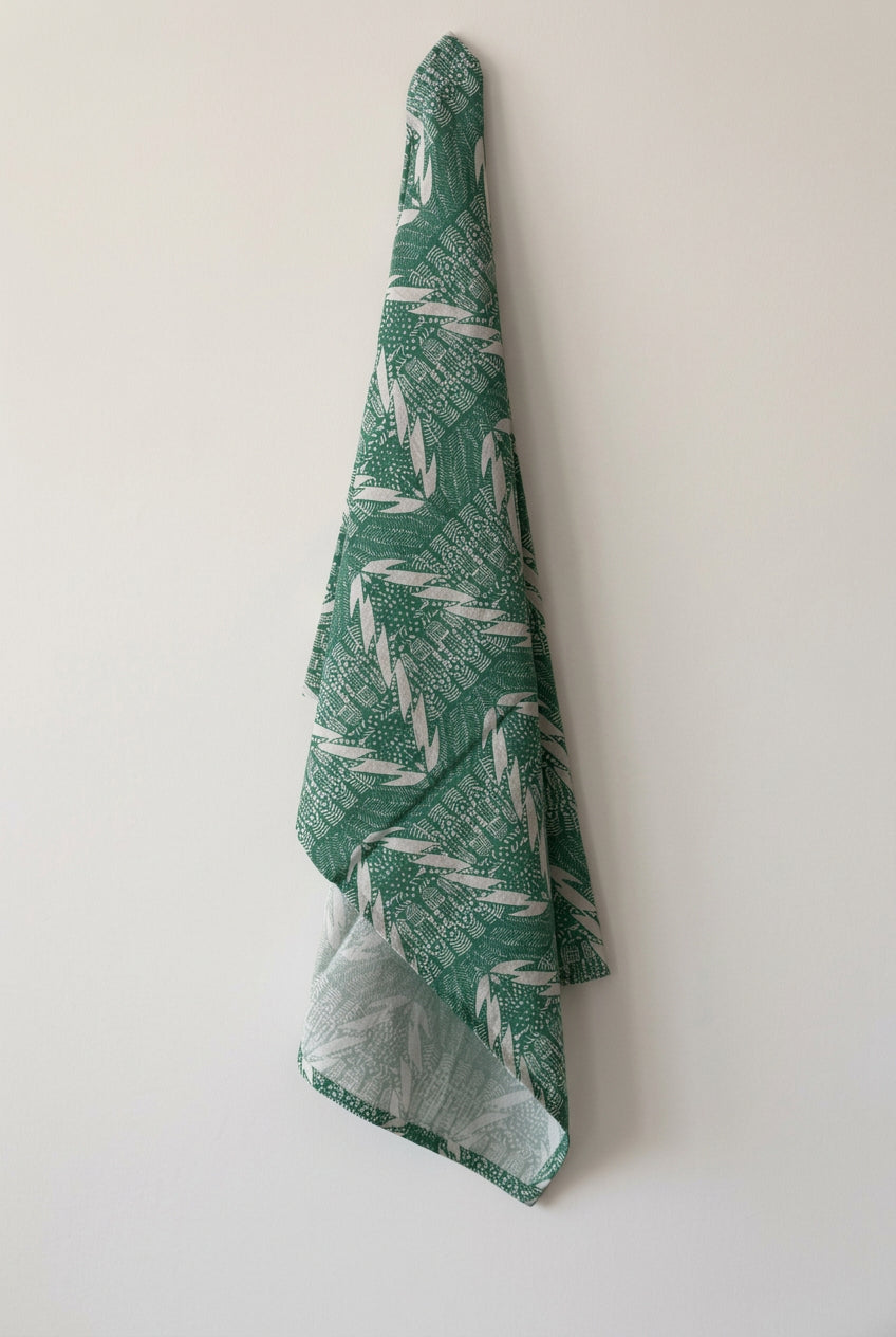 Evergreen Trees Tea Towel by Jennifer Judd-McGee