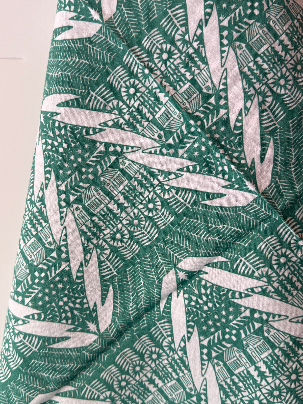 Evergreen Trees Tea Towel by Jennifer Judd-McGee