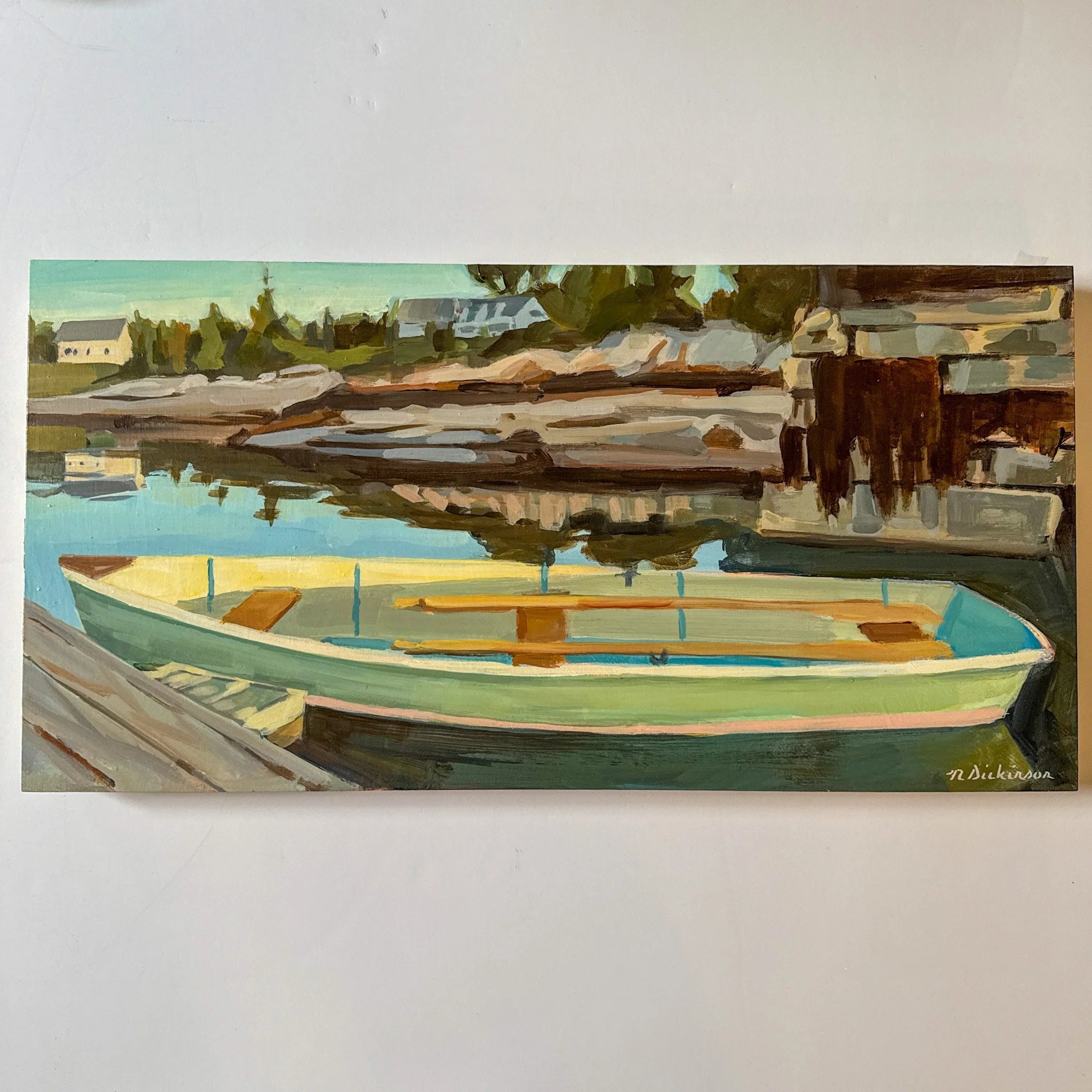 Painting of a boat on a dock with a scenic background