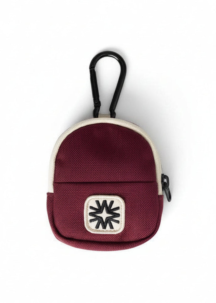 Image of front of keychain pouch in Berry by Walker Family Goods.
