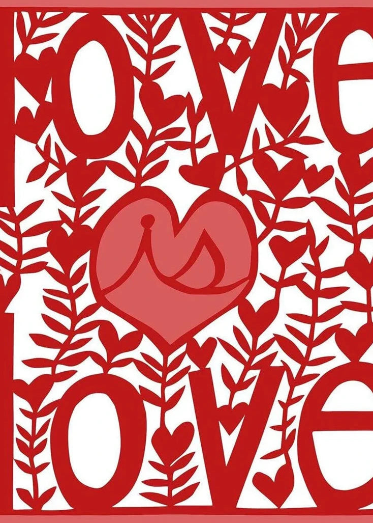 Red and white decorative paper cutout with 'love' text and heart design.