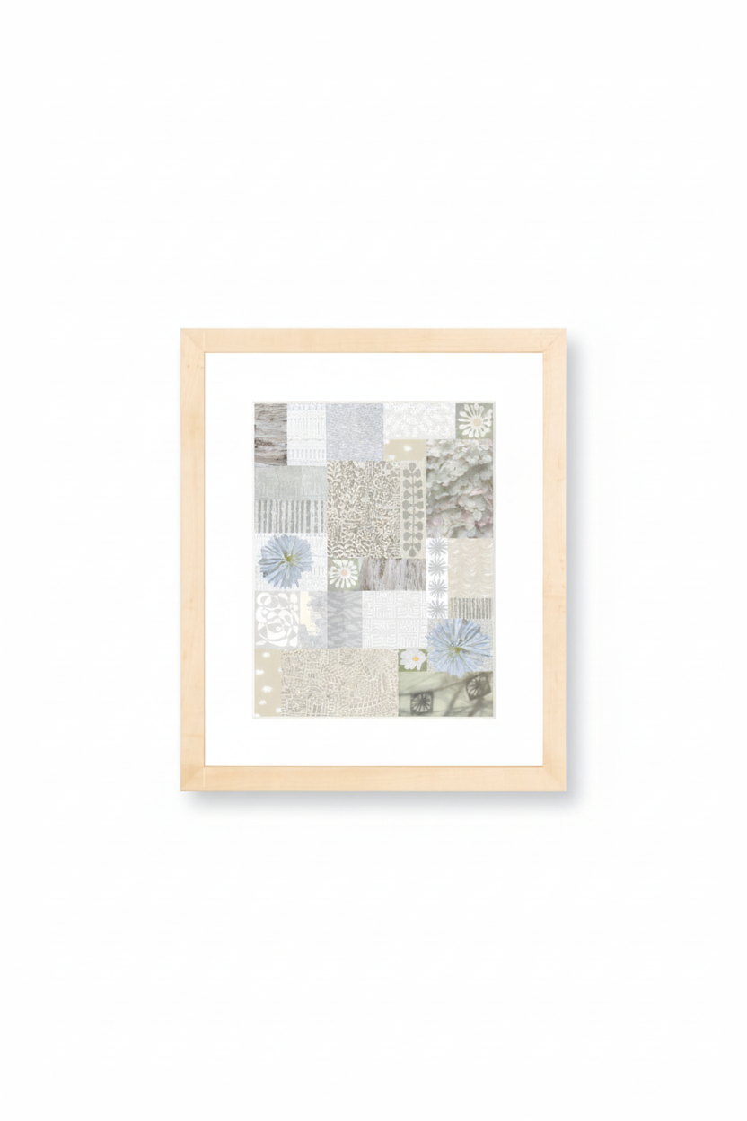Framed abstract art print with a light wooden frame on a white background