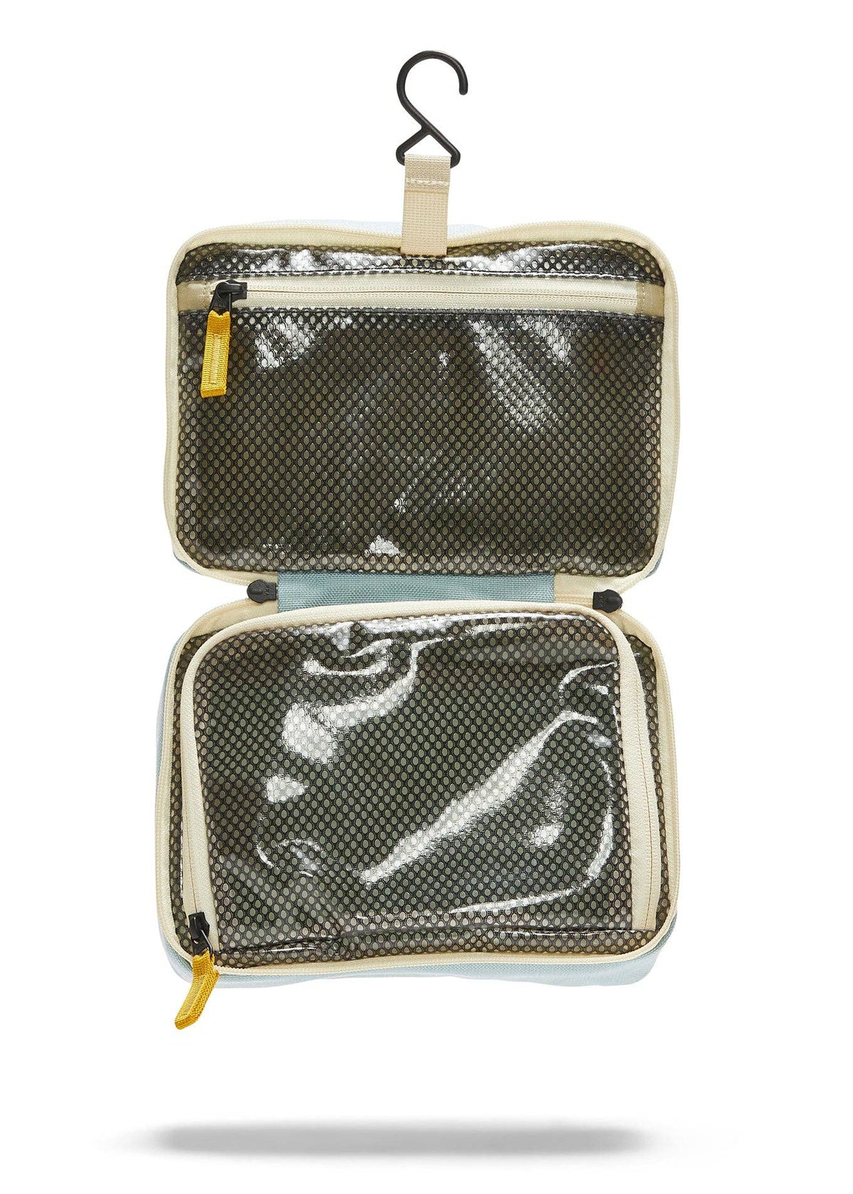 Interior photo of the toiletry bag featuring clear mesh zipper pockets and a hook for hanging.