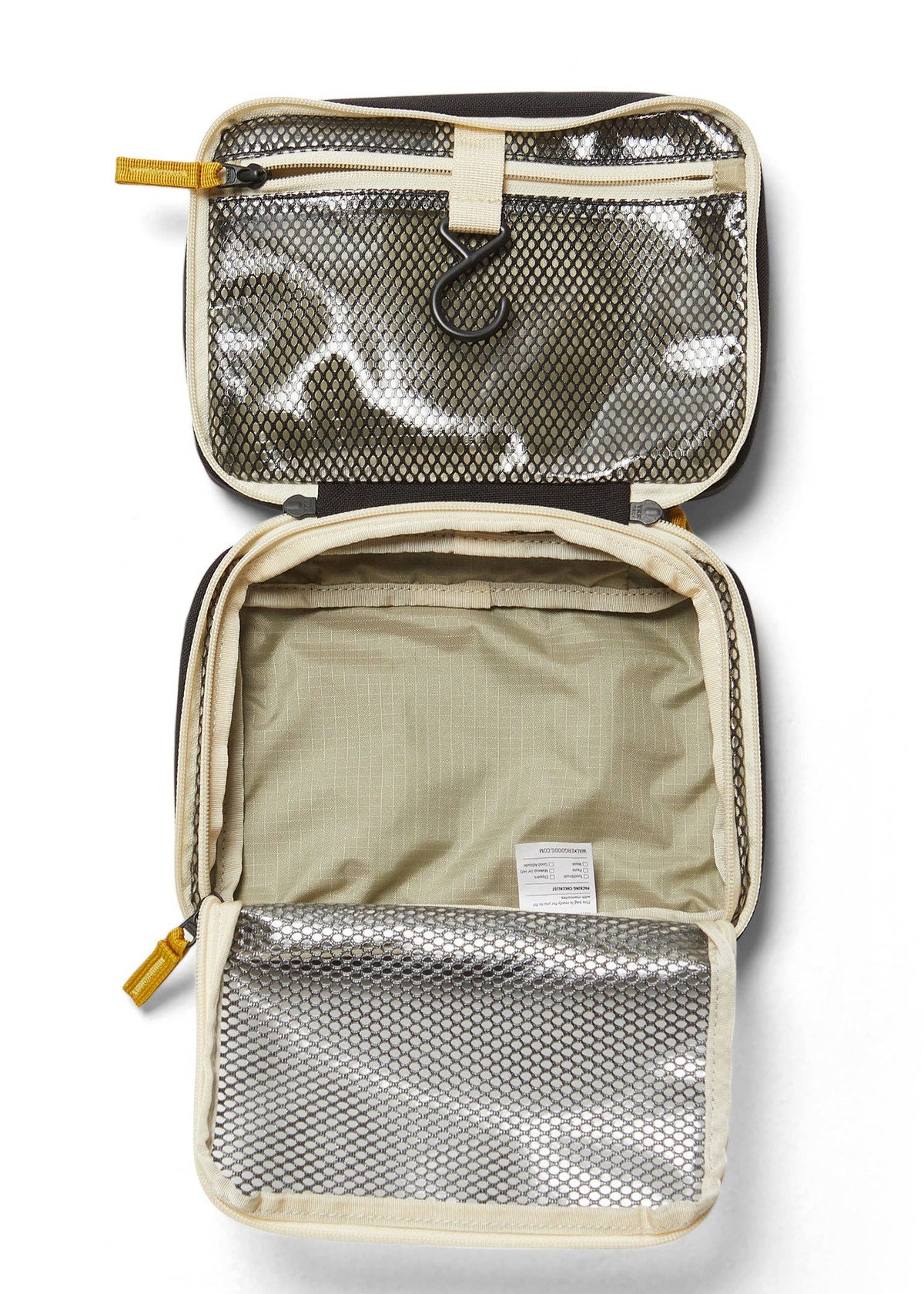 Interior photo of the Toiletry Bag featuring open clear mesh zipper pockets and a hook for hanging.