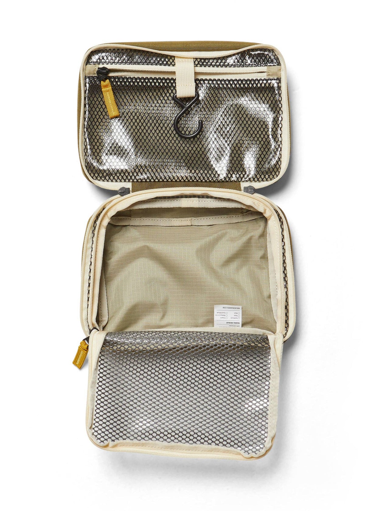 Interior photo of the Toiletry Bag featuring open clear mesh zipper pockets and a hook for hanging.