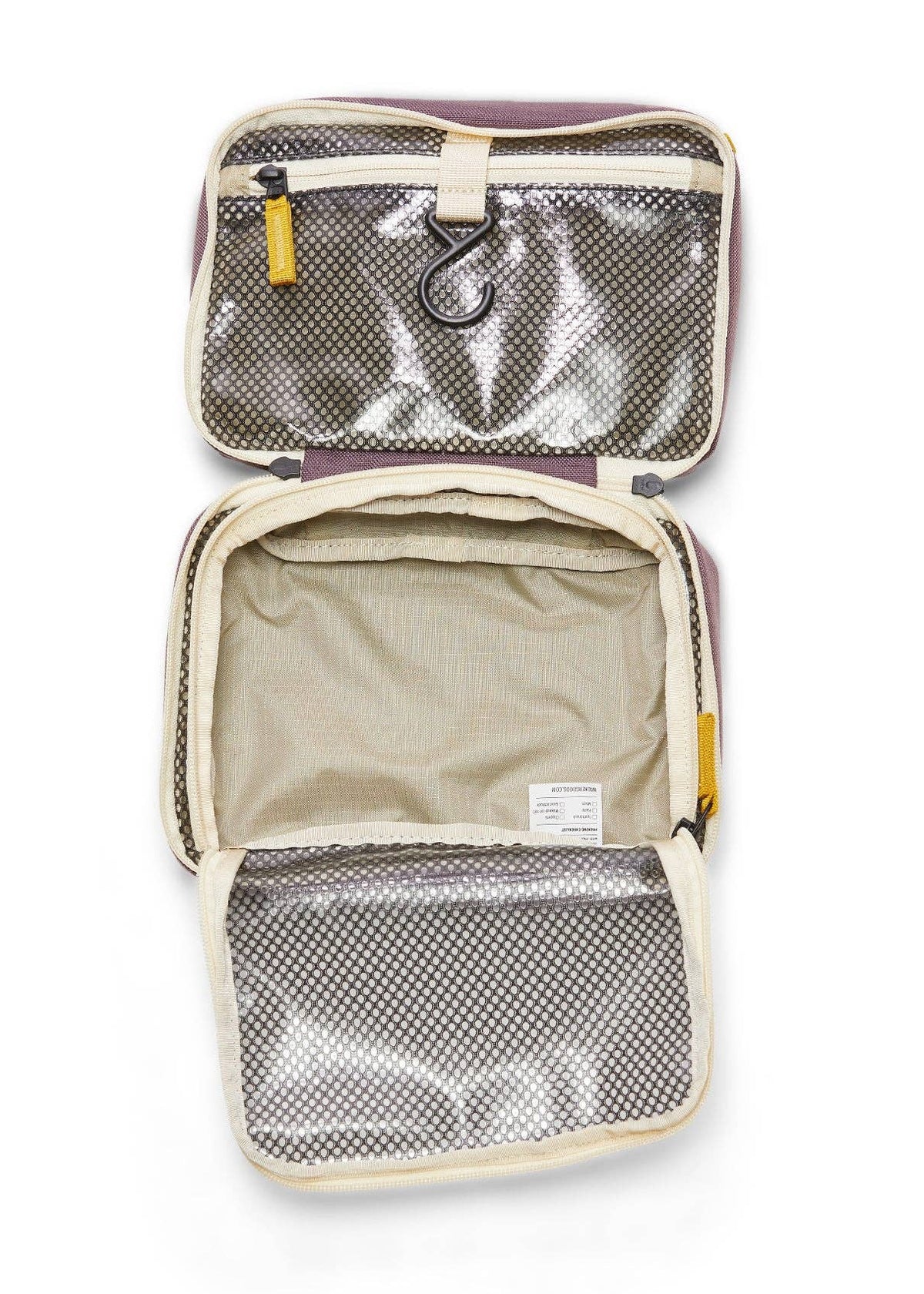 Interior photo of the Toiletry Bag featuring open clear mesh zipper pockets and a hook for hanging.