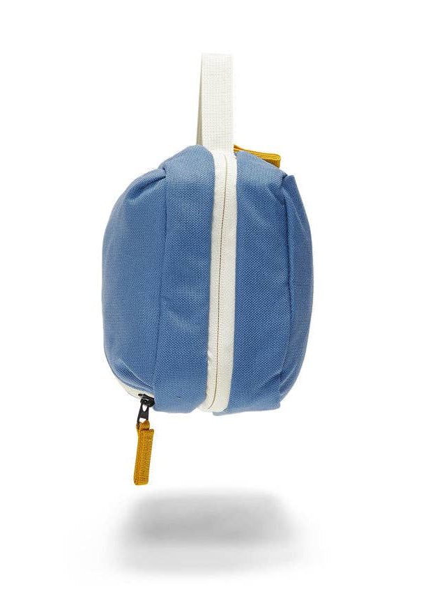 Side view of Toiletry Bag showing yellow zipper details.