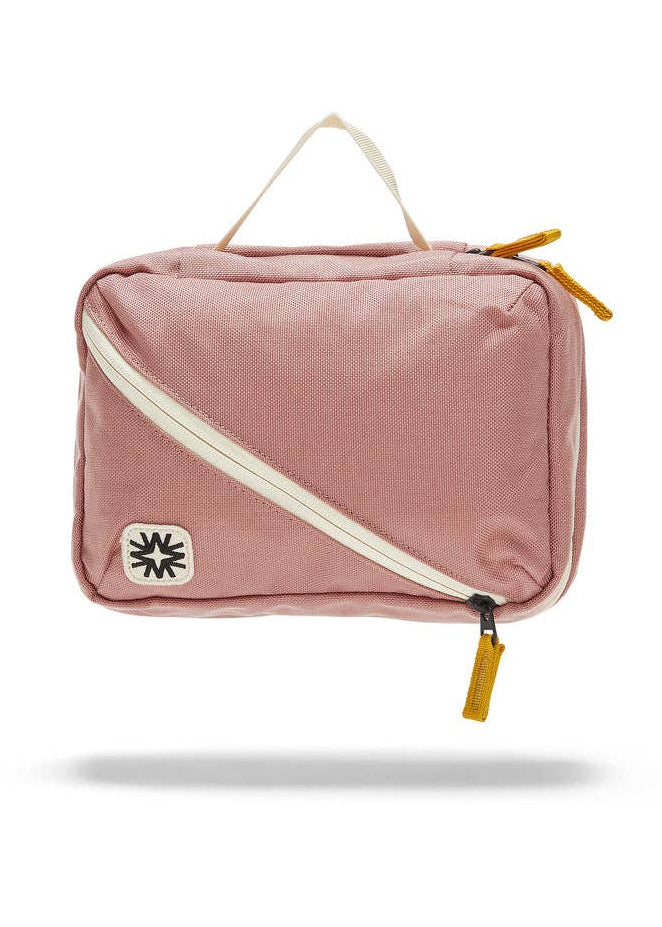 Front view of toiletry bag showing top handle, and front diagonal pocket.