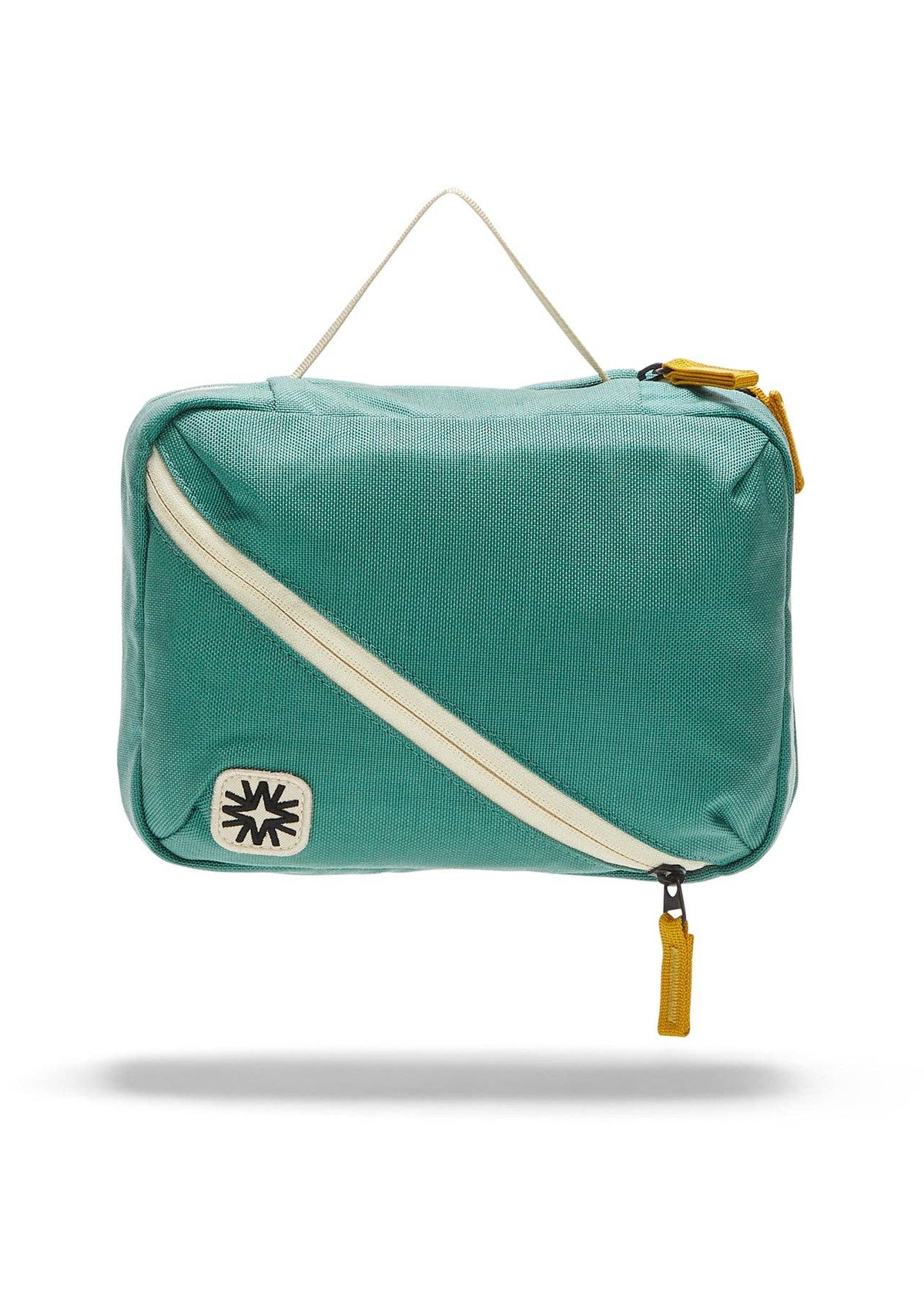 Front view of toiletry bag showing top handle, and front diagonal pocket.