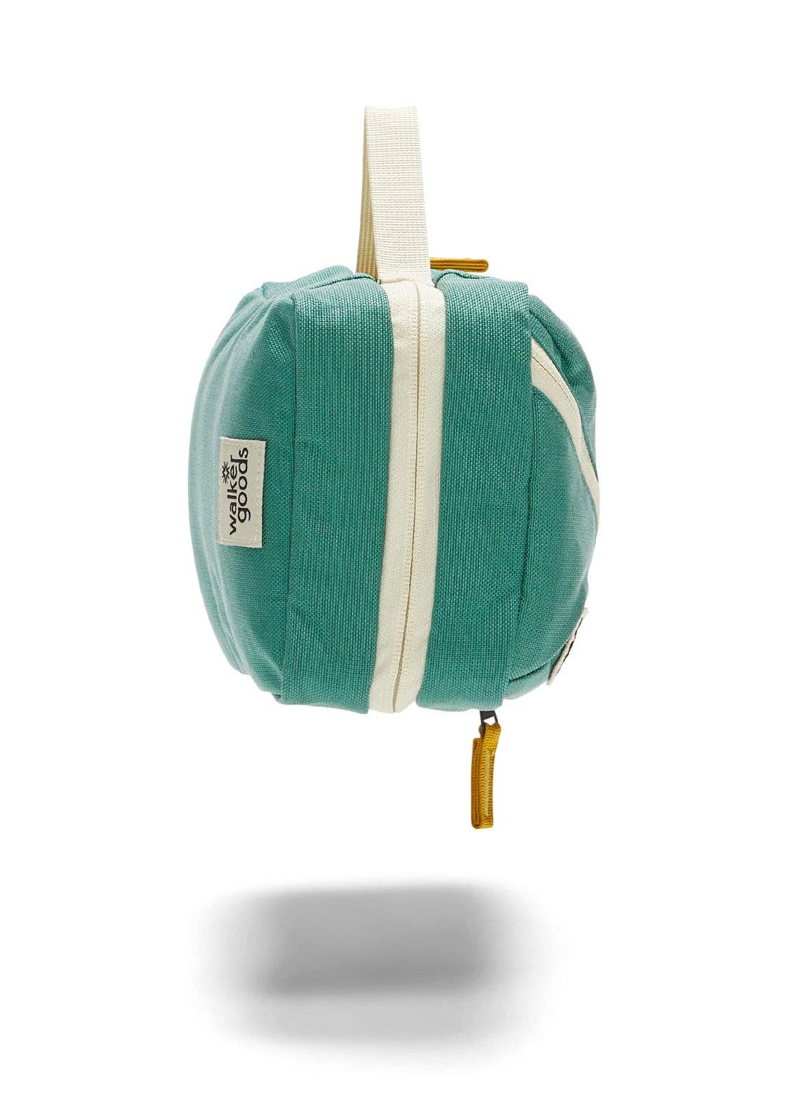 Side view of Toiletry Bag showing yellow zipper details.