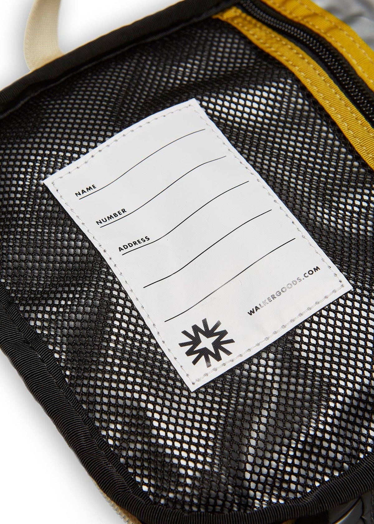 Interior label of lunchbox with room for name, number and address.